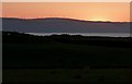 NR7436 : Sunset over Beinn an Tuirc windfarm from Arran by Rob Farrow