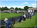 TL6161 : The July Course, Newmarket - Horses leaving the parade ring by Richard Humphrey