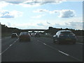 SP5816 : M40 motorway approaching Newgate Road bridge by Peter Whatley