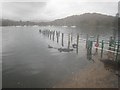 NY3703 : Submerged jetty at Waterhead by Graham Robson