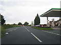 SO7926 : A417 and filling station near Corse by Colin Pyle