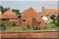 SK8566 : Pear Tree Farm, outbuilding by Alan Murray-Rust