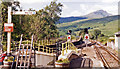 NN3825 : View north from Crianlarich station, 1986 by Ben Brooksbank