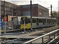 SD9408 : Metrolink Tram Arriving at Shaw and Crompton by David Dixon