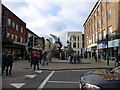 TL0549 : Rick Kirbys sculpture of two Silver Faces in Silver Street, Bedford by PAUL FARMER