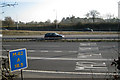 SP1272 : M42 junction 3a west: road markings by Robin Stott