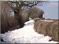 SK1042 : Snowdrifts on Broomfield Lane by Ian Calderwood