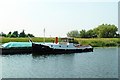 TL5899 : Old tug boat at moorings south of Denver by Rose and Trev Clough