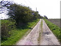 TM4071 : Entrance to South Manor Farm and footpath to Willow Marsh Lane by Geographer