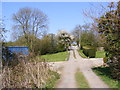 TM4071 : Entrance to South Manor Farm & footpath by Geographer