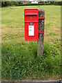 TM1236 : Wheatsheaf Church Road Postbox by Geographer