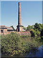 SE2734 : Goit and Chimney, Armley Mills by David Dixon