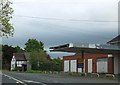 SO9049 : Bus shelter by former garage in Stoulton by David Smith