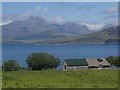 NG6113 : Field and house with sea and mountain view by Andrew Hill