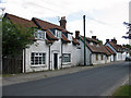 SE8873 : White-painted stone cottages along the street by Pauline E