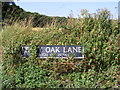 TM2699 : Leafy Oak Lane sign by Geographer