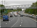 TQ4974 : Footbridge over East Rochester Way (A2) by David Dixon