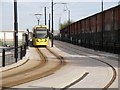 SD8912 : Metrolink Tram on High Level Road by David Dixon