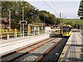 SD9311 : Metrolink tram Arriving at Newhey by David Dixon