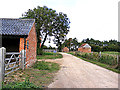 TM3093 : Entrance to The High House & Brickyard Farm by Geographer