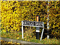 TM2996 : Kirstead Green sign by Geographer