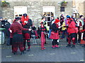 TL2797 : Ox Blood Molly Dancers take a break - Whittlesea Straw Bear Festival 2014 by Richard Humphrey