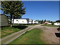 NH7438 : Auchnahillin Holiday Park Main Level by Tom Gibson