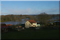 SJ2610 : Cefn, near Welshpool: Lower Cefn and flooded Severn valley, from the train by Christopher Hilton