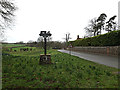 TM2499 : The Street & Shotesham Village sign by Geographer