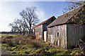 NT0804 : Old barns by Richard Dorrell