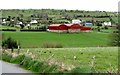 J0422 : Red tin-roofed farm buildings off Seavers Road by Eric Jones