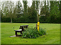 TM4195 : Seat & bridleway sign on Maypole Green by Geographer