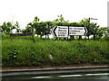 TM4197 : Roadsigns on the B1136 Yarmouth Road by Geographer