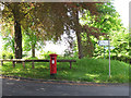 TQ3964 : Postbox and signpost, Layhams Road by Stephen Craven