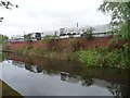 SD8600 : Reflections of stored chemicals, Rochdale Canal by Christine Johnstone