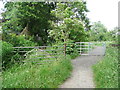 SE2222 : Kissing gate on new path along edge of restored waste tip  by Humphrey Bolton