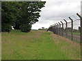 TM3453 : Footpath near Bentwaters Parks by Roger Jones