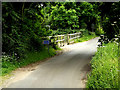 TL8346 : Entering Essex on Pentlow Road by Geographer