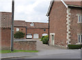 SK6869 : View into Hall Farm farmyard by Alan Murray-Rust