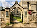 TF0008 : The War Memorial Arch, Great Casterton Church by David Dixon