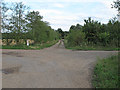 TL8914 : Farm tracks cross at Tiptree Farm by Roger Jones