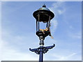 TV6198 : Fire damaged lamp on Eastbourne Pier by PAUL FARMER