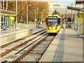 SJ8292 : Metrolink Tram at Barlow Moor Road by David Dixon