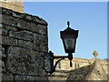 SK9716 : Church of St Mary: lamp at the gate by Bob Harvey