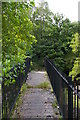 NY7962 : River Allen: defunct footbridge at Plankey Mill by Christopher Hilton