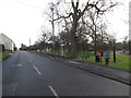 TM4556 : A1094 Victoria Road & Victoria Road Postbox by Geographer