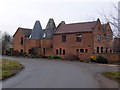 SO7853 : Former hop kilns, Leigh by Chris Allen