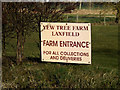 TM2872 : Yew Tree Farm sign by Geographer