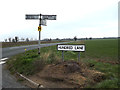 TM0564 : Roadsign & Hundred Lane sign by Geographer