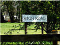 TM2784 : High Road sign by Geographer